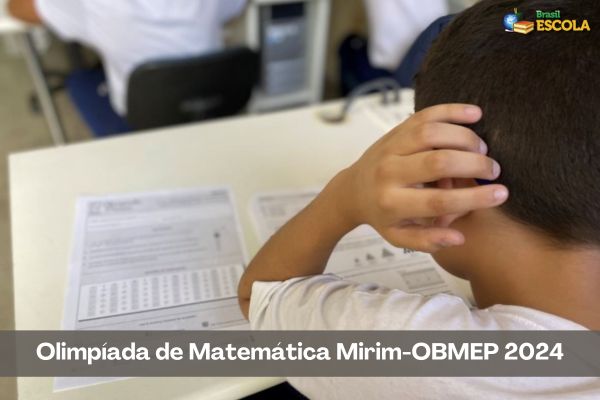 Criança fazendo prova da Olimpíada Mirim-OBMEP 2024