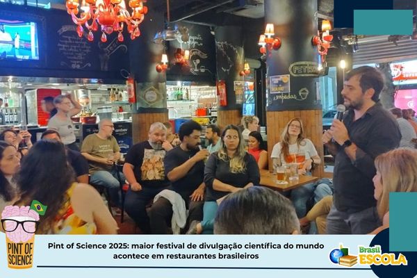 Estudante sorri. Texto na imagem: Ciências da Natureza no Enem 2024.